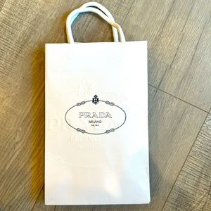 2 Prada small paper/rope shopping bags. 10” tall 6.5” wide. 2 come together